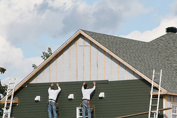 Professional Storm Damage Siding Repair technician working in Lemont, IL
